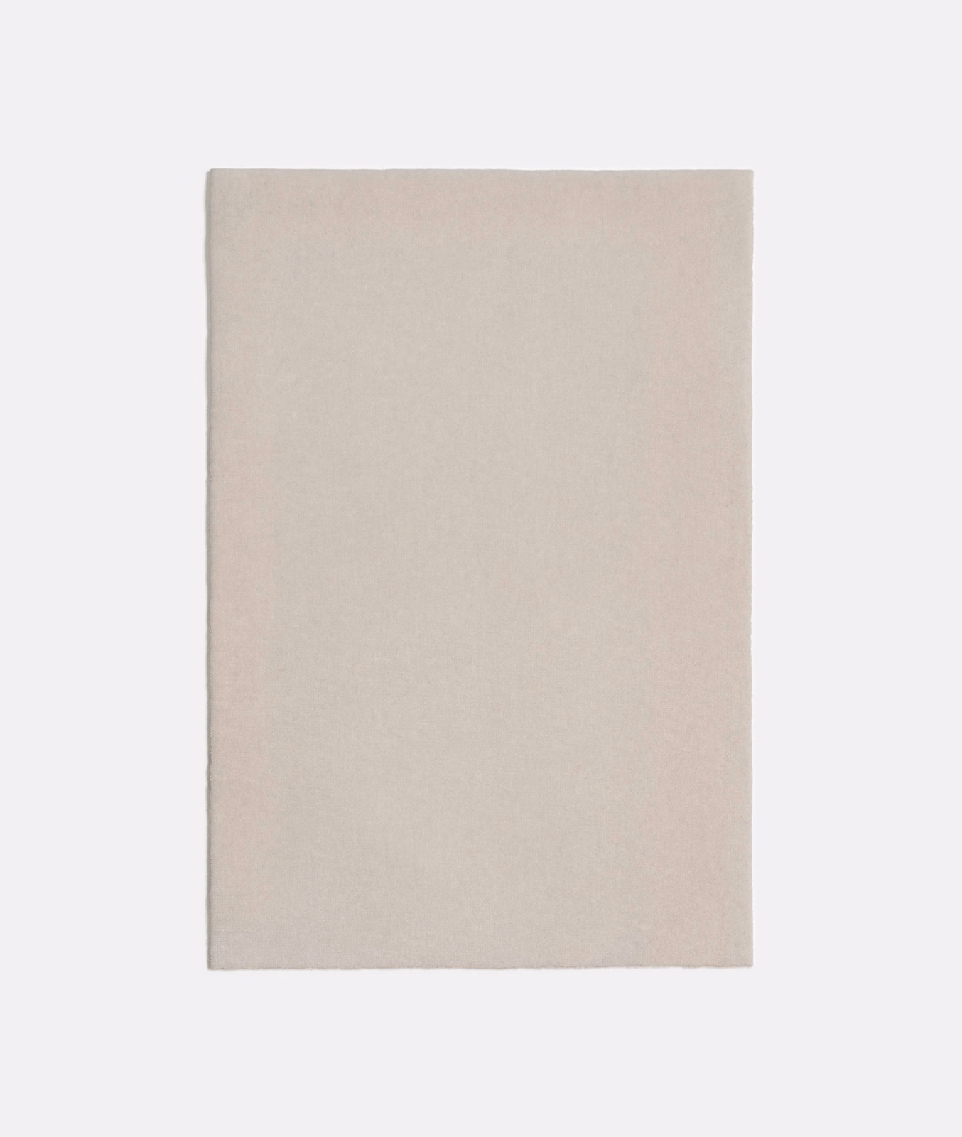 Warm off-white Dedar fabric with a subtle, even surface texture