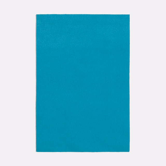Saturated seafoam teal fabric swatch with a subtle fine woven texture