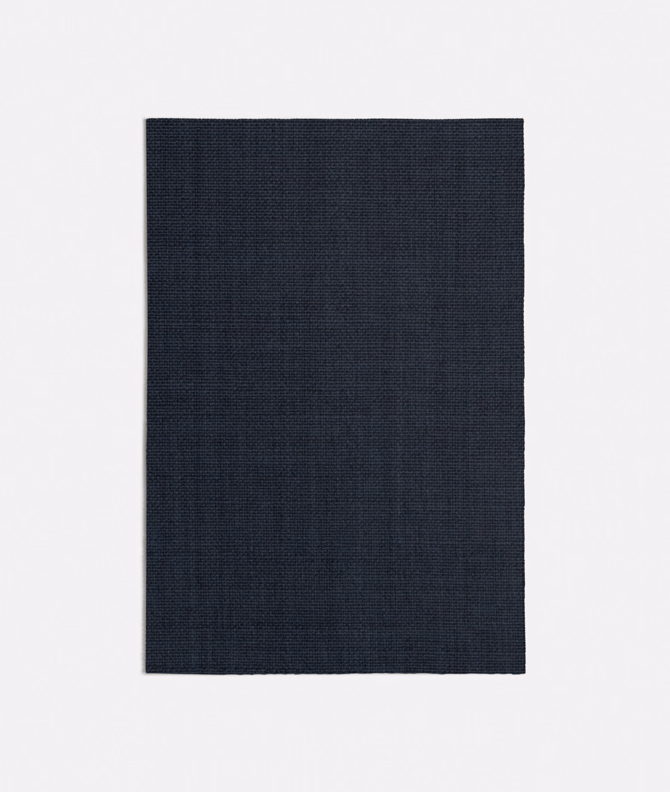 Deep charcoal-blue fabric swatch showing a fine, tightly woven plain texture