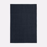 Deep charcoal-blue fabric swatch showing a fine, tightly woven plain texture
