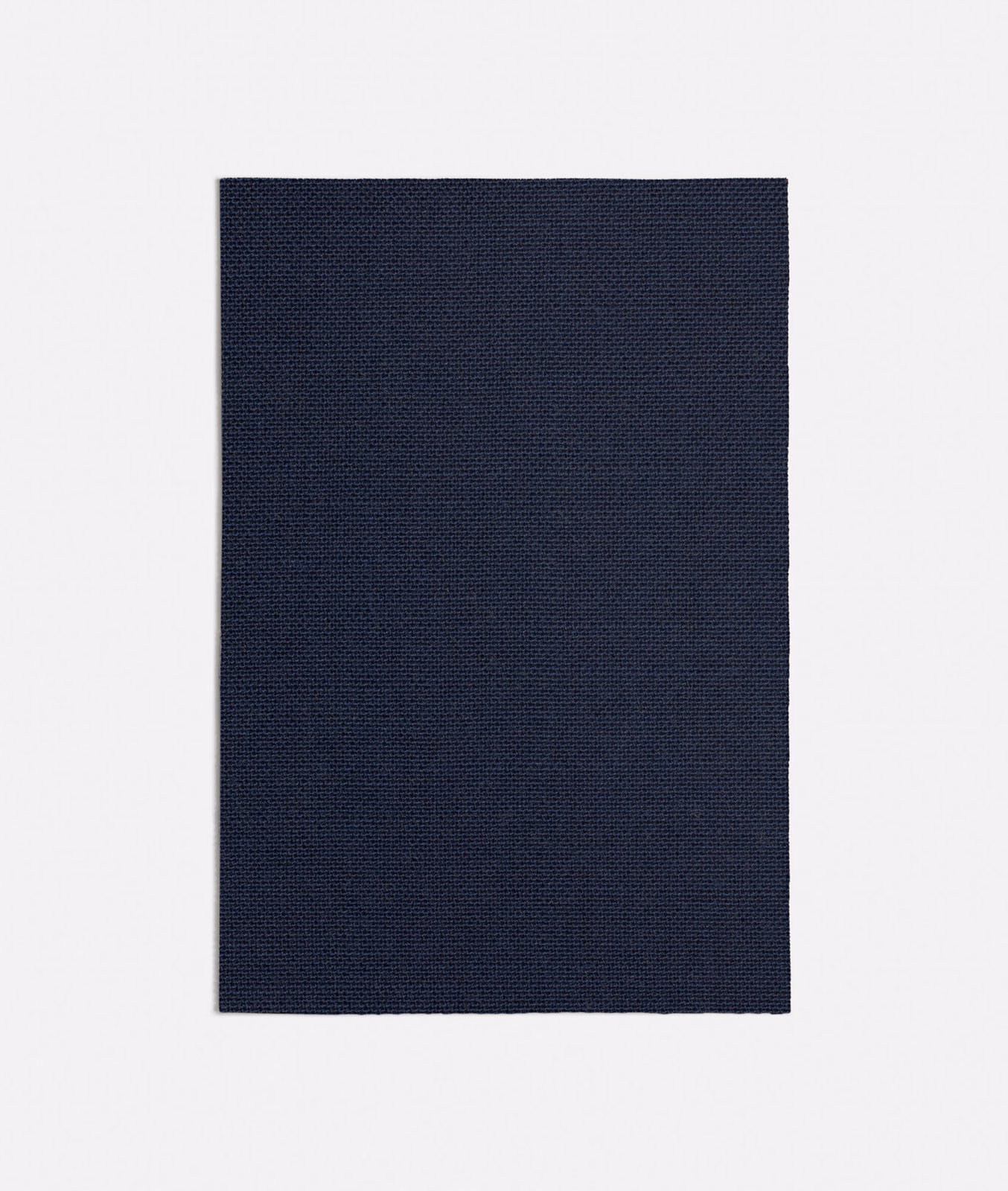 Deep ink navy fabric swatch with a compact, subtly tonal woven texture