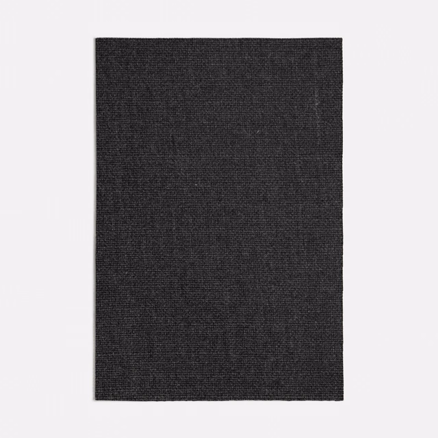 Dark charcoal grey fabric swatch showing a fine, tightly woven surface with subtle tonal depth