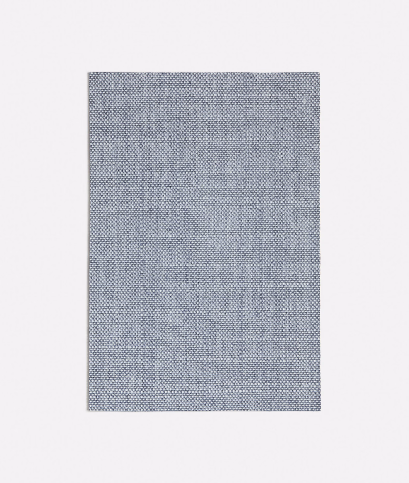 Cool blue-grey woven fabric with a tiny regular check and lightly textured surface