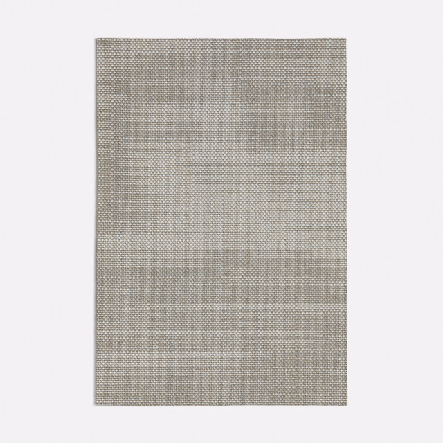 Close view of a finely grained greige basket weave with subtle tonal variation