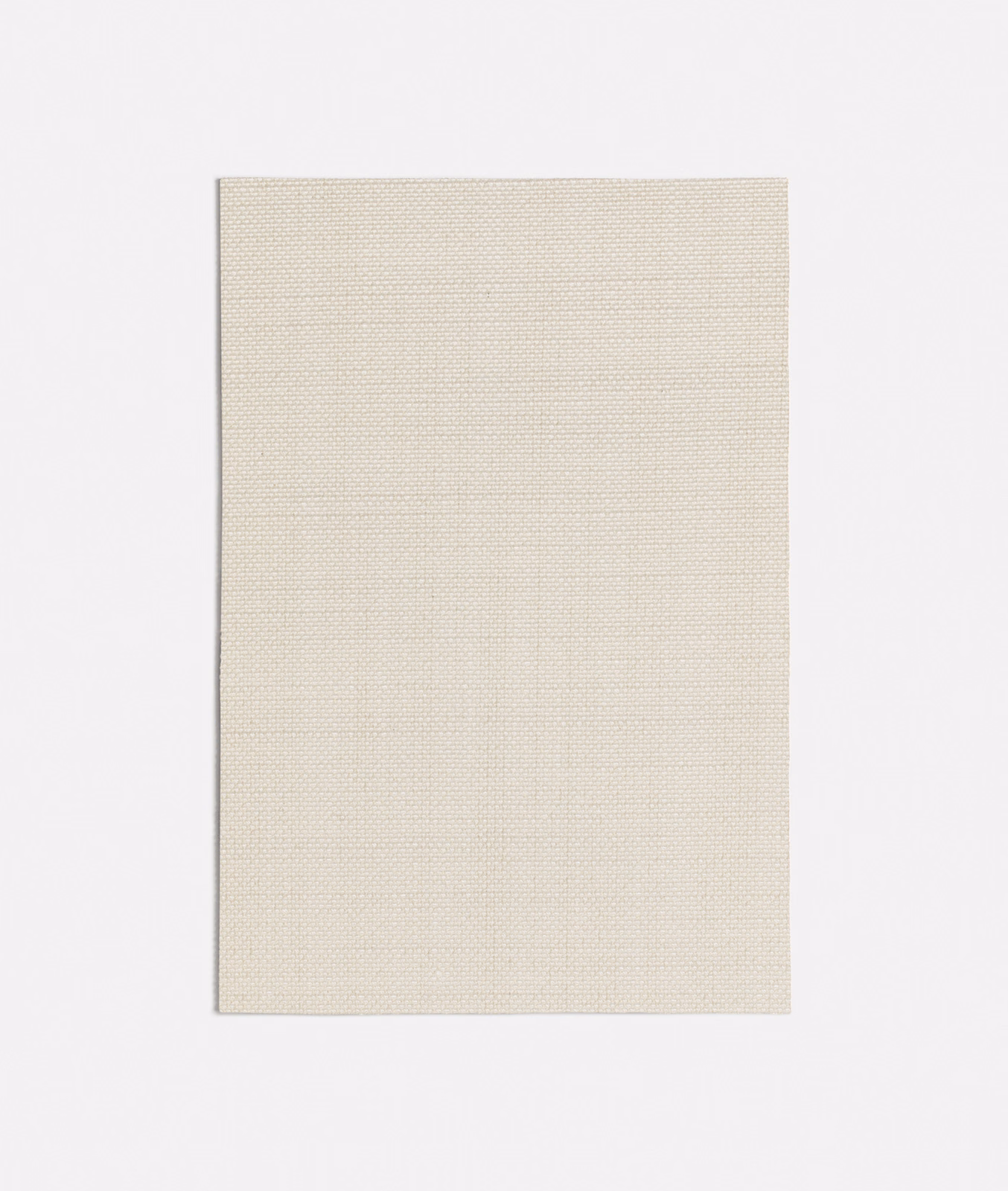 Warm off-white fabric showing a fine, softly textured crosshatch weave