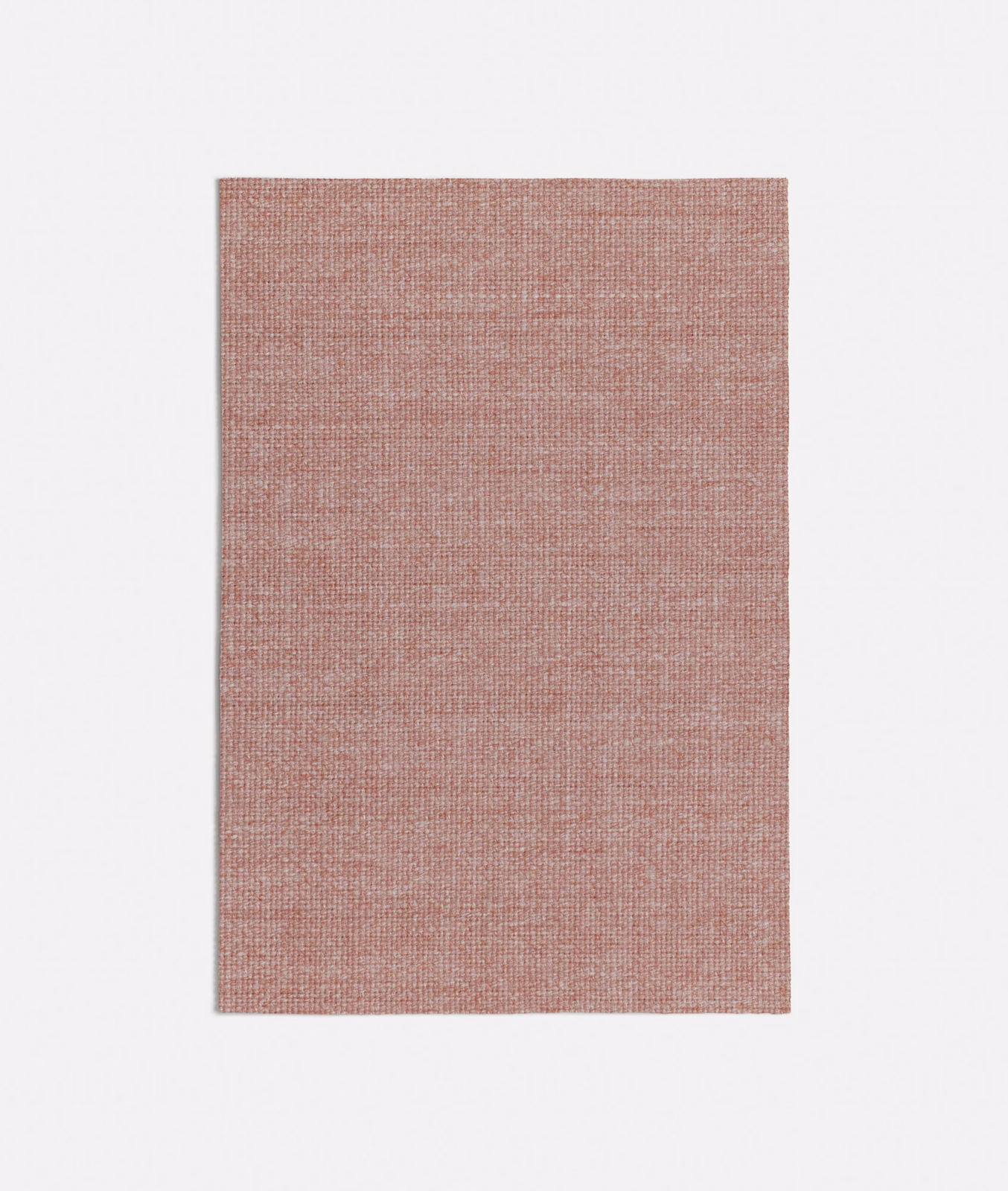 Muted dusty pink fabric with a fine, close crosshatched woven texture