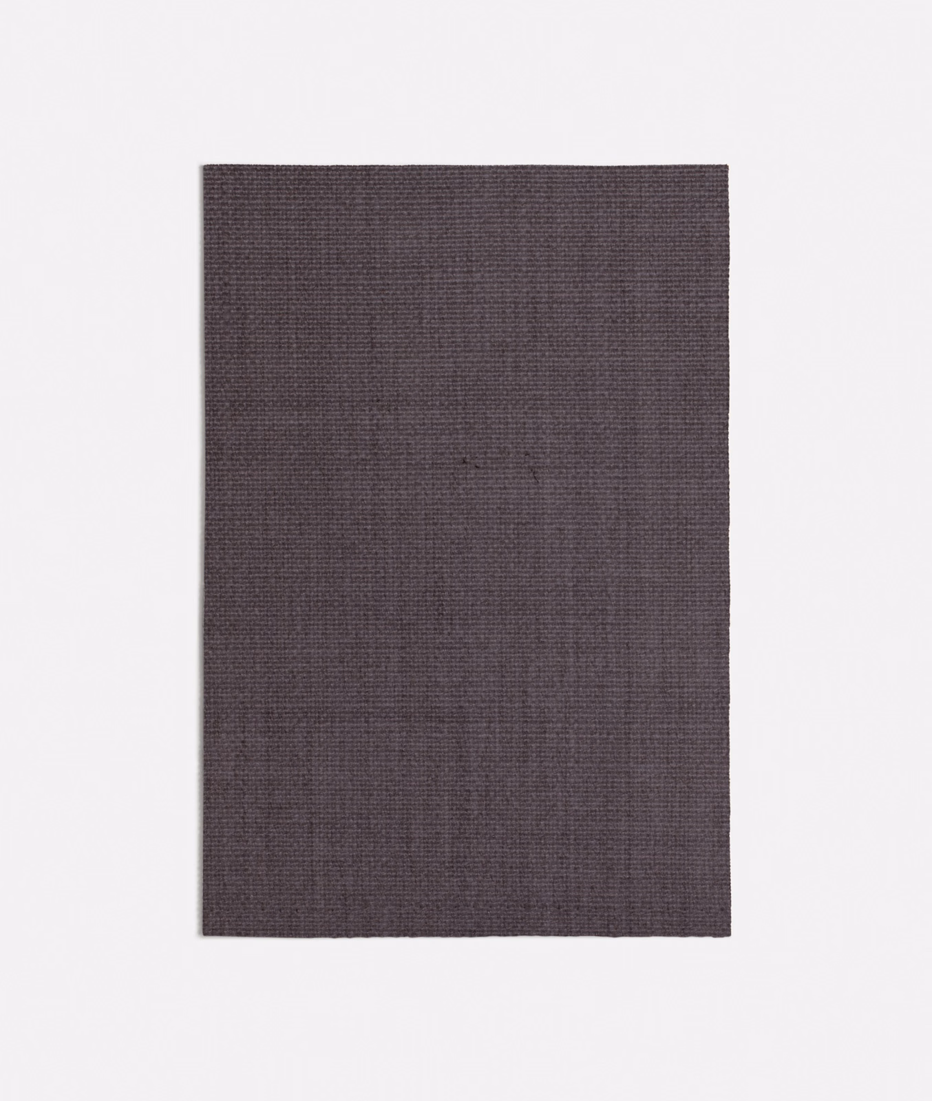 Muted aubergine-purple textile with a fine, even crossweave and softly mottled depth