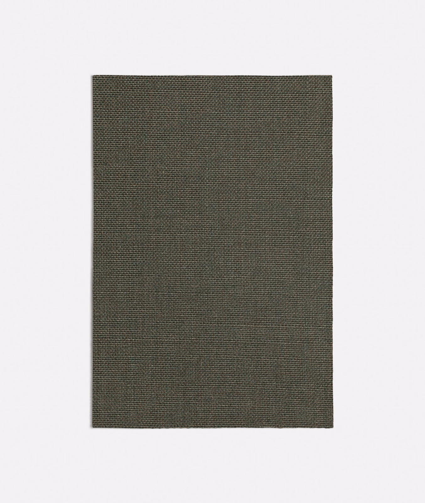 Close view of tightly woven dark sage green plain fabric with subtle tonal texture