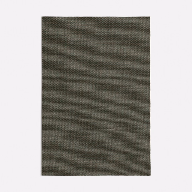 Close view of tightly woven dark sage green plain fabric with subtle tonal texture