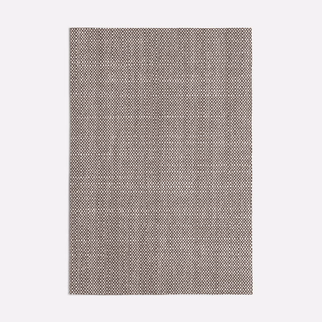Warm taupe fabric with a dense dark-and-pale geometric micro-grid weave