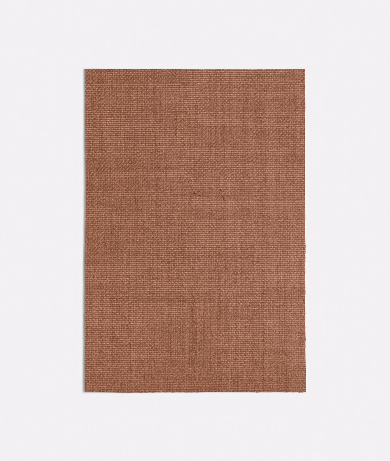 Warm terracotta-brown fabric with a fine, even crosshatched weave