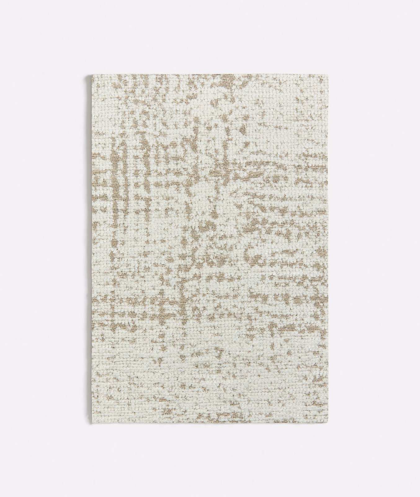 Pale beige woven swatch with irregular taupe mottling and a softly textured grid