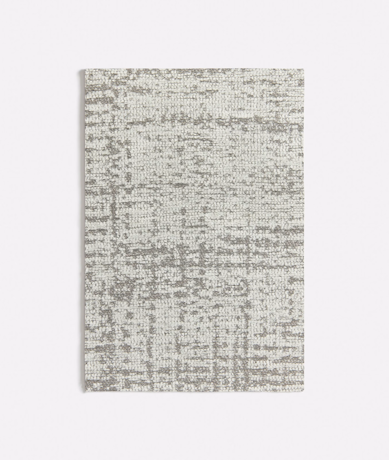 Pale grey woven swatch with mottled darker threads and horizontal striations