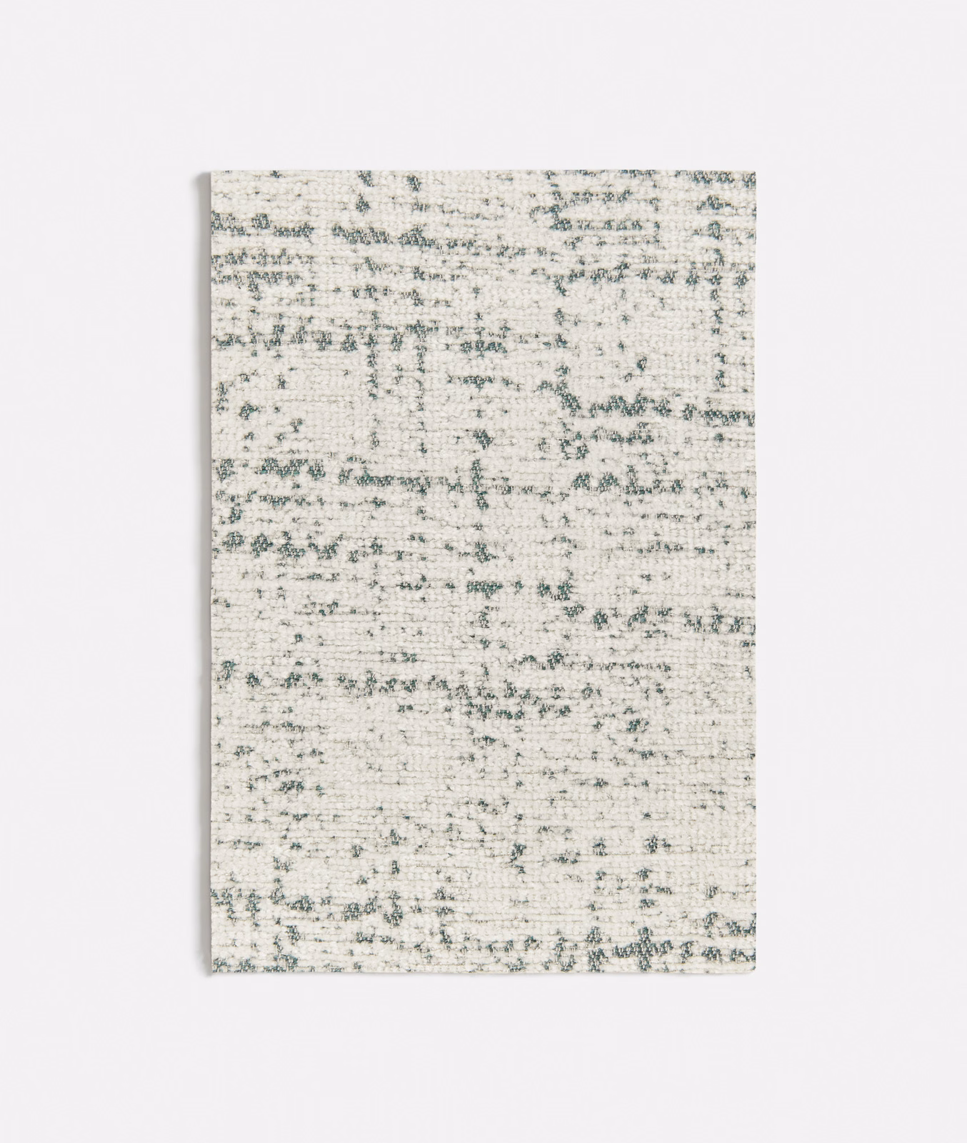 Pale cream woven fabric with mottled seafoam-green horizontal flecks and soft texture