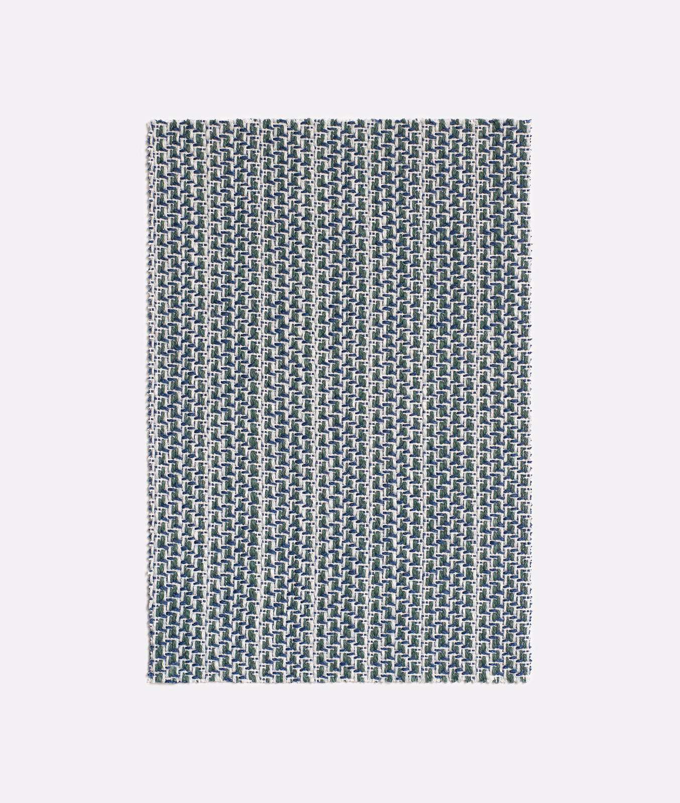Cool blue-grey Filigrana textile with a small pale interlocking geometric weave