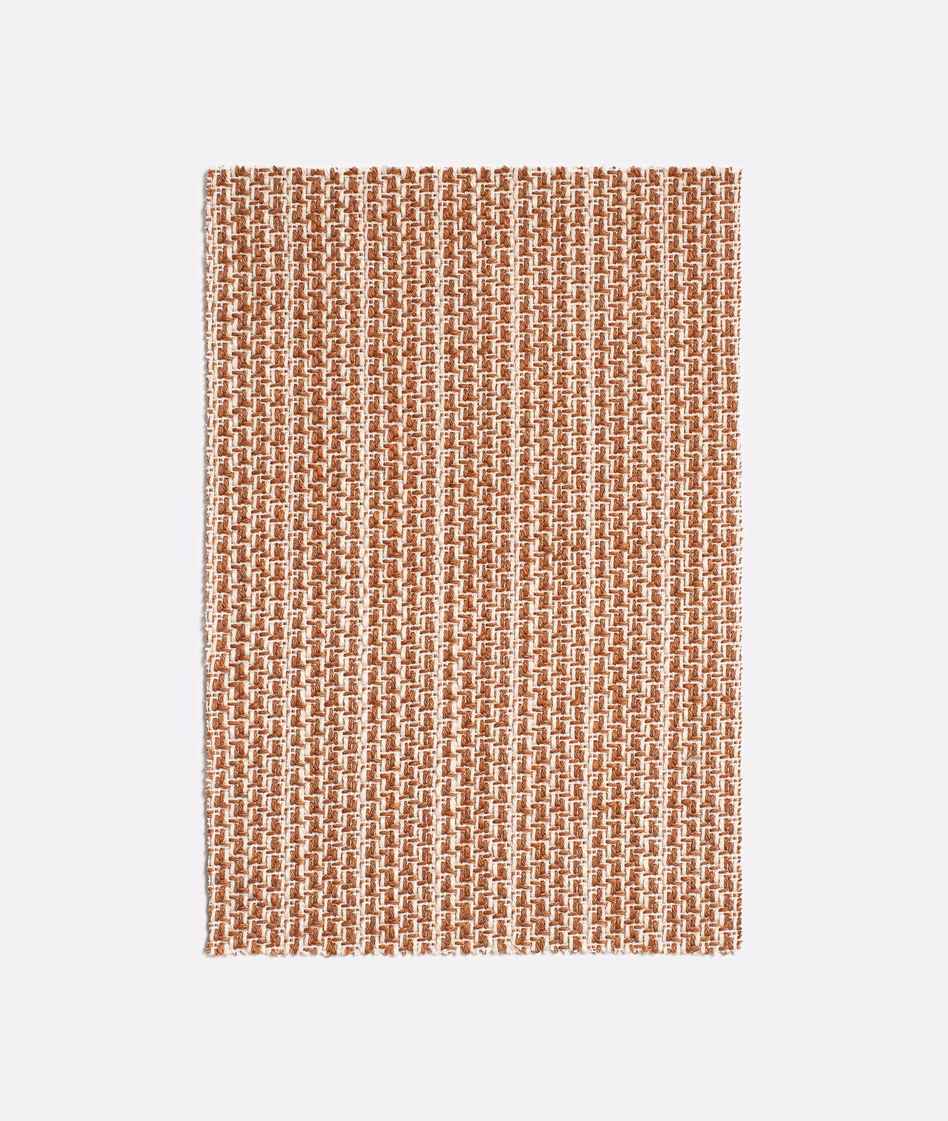 Warm terracotta and ivory woven textile with a fine repeating vertical geometric motif