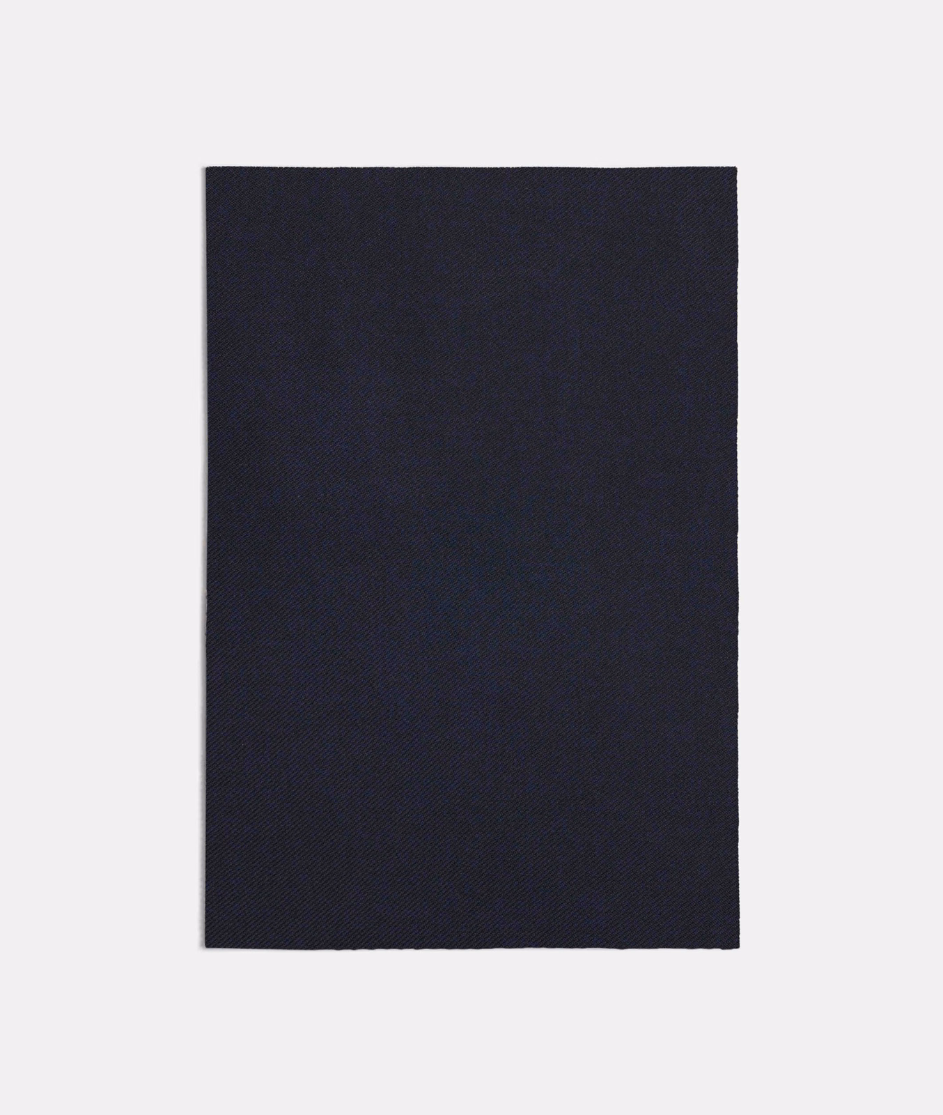 Near-black navy blue fabric swatch with a fine, subtly diagonal weave