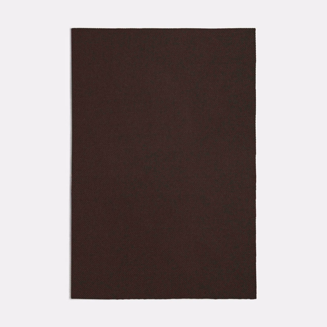 Deep chocolate-brown Garzato swatch with a subtle, fine woven surface