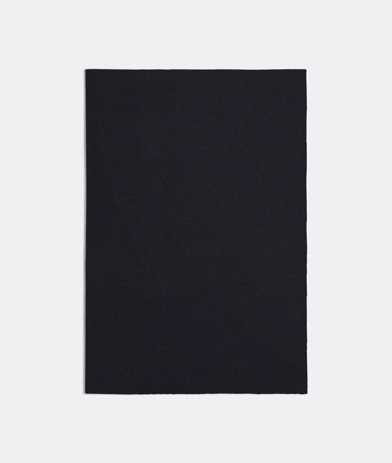 Near-black navy blue woven swatch with a subtle diagonal texture