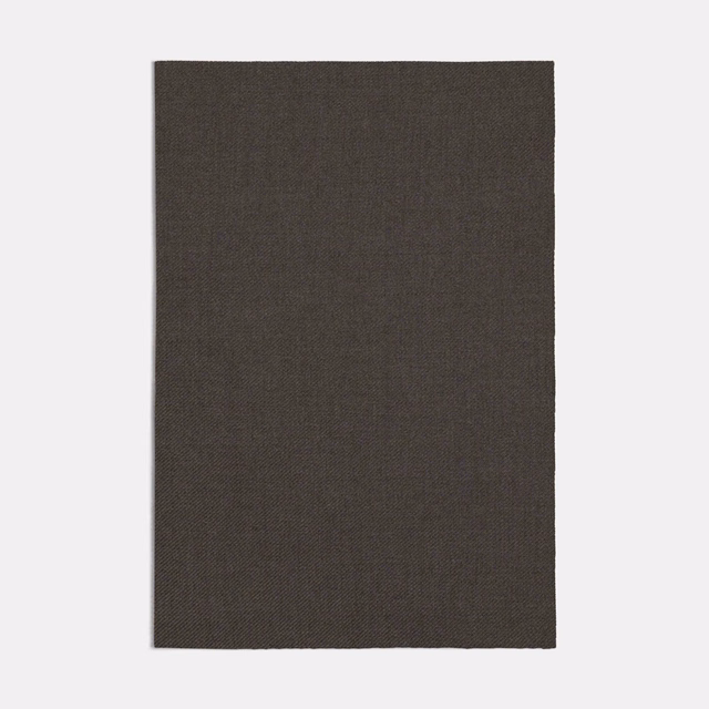 Deep smoky grey Garzato textile with a compact, subtly textured weave