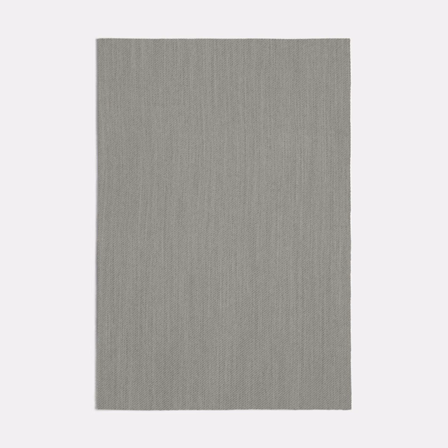Cool grey textile swatch with fine vertical striations and a subtly textured weave