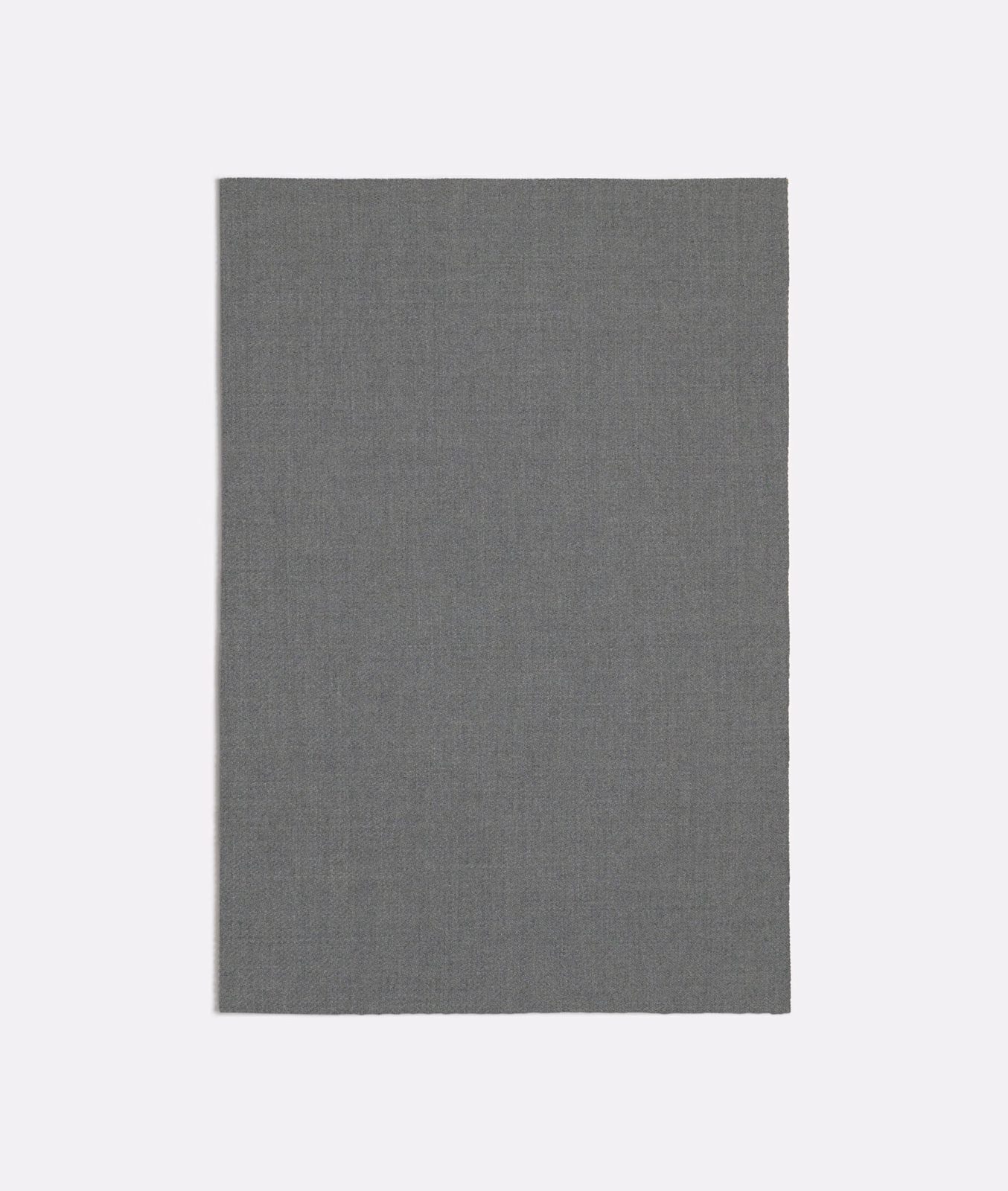 Close view of cool grey Garzato fabric with a fine, softly brushed weave.