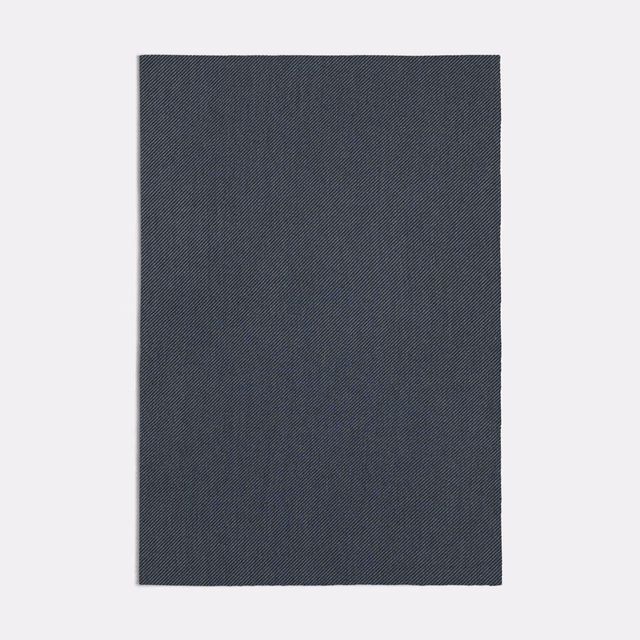 Deep jeans-blue swatch showing a fine, charcoal-toned diagonal woven texture