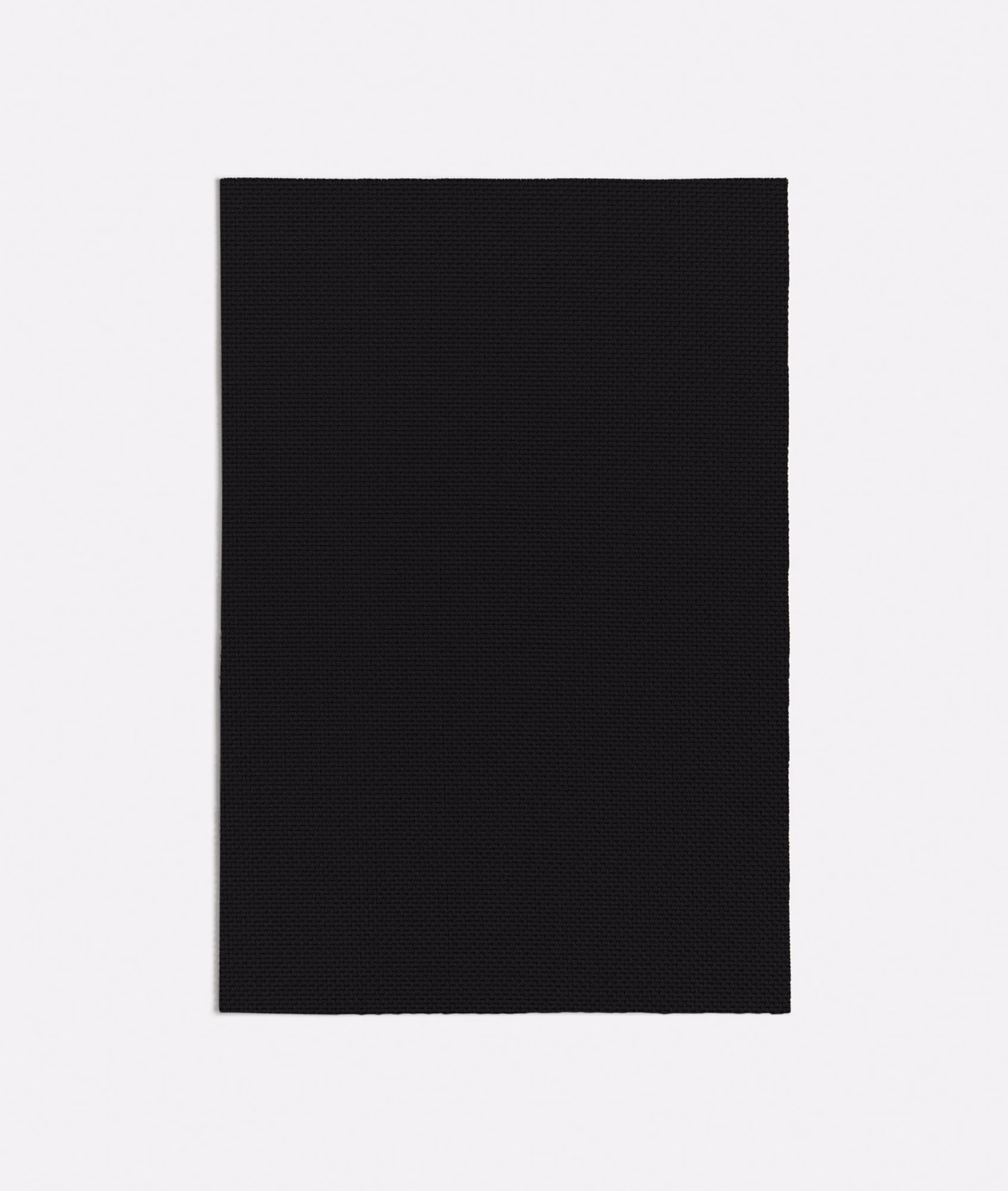Near-black Ginostra swatch showing a compact, subtly textured woven surface