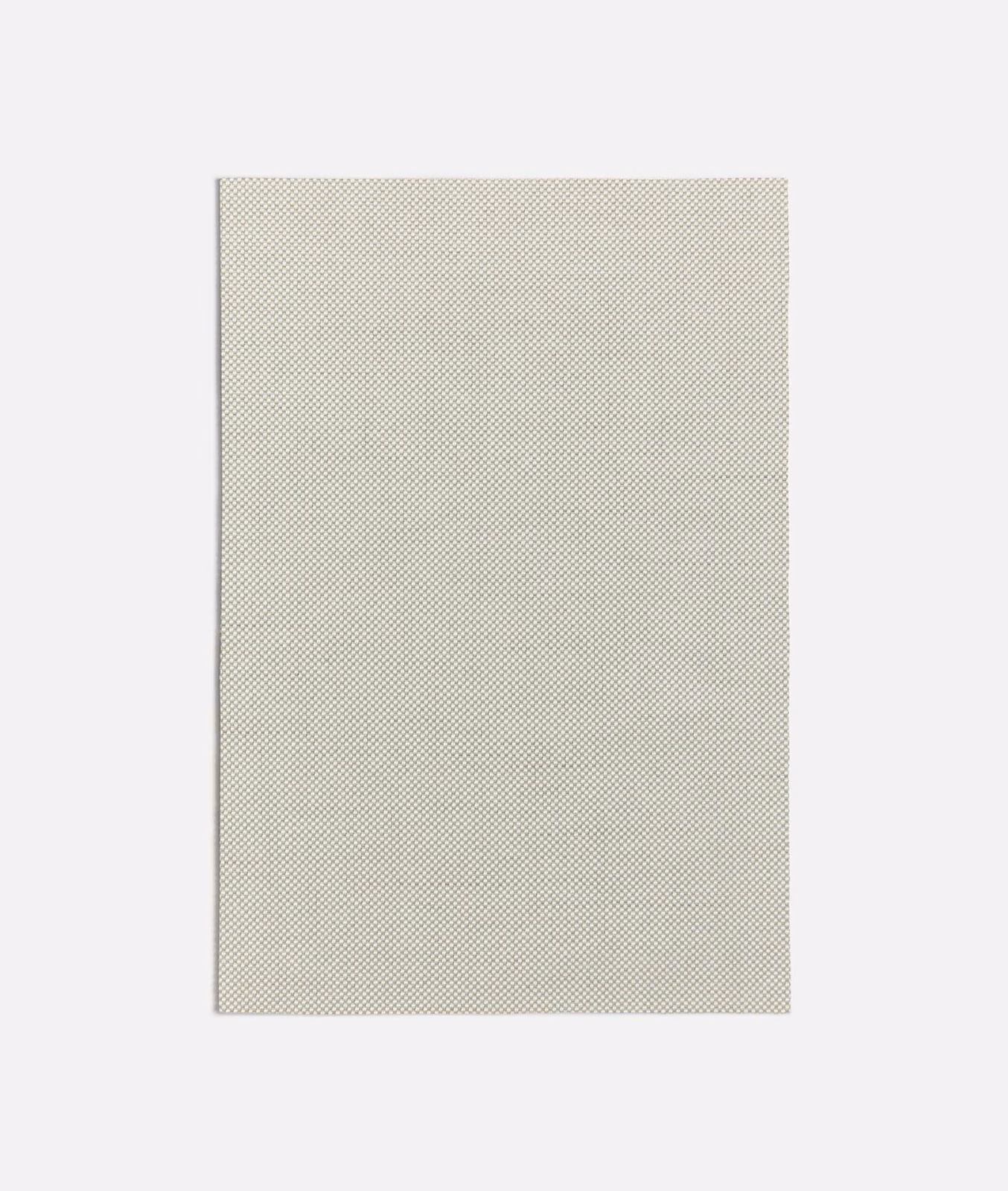 Pale warm-grey Ginostra textile with a tightly repeated micro-check woven texture