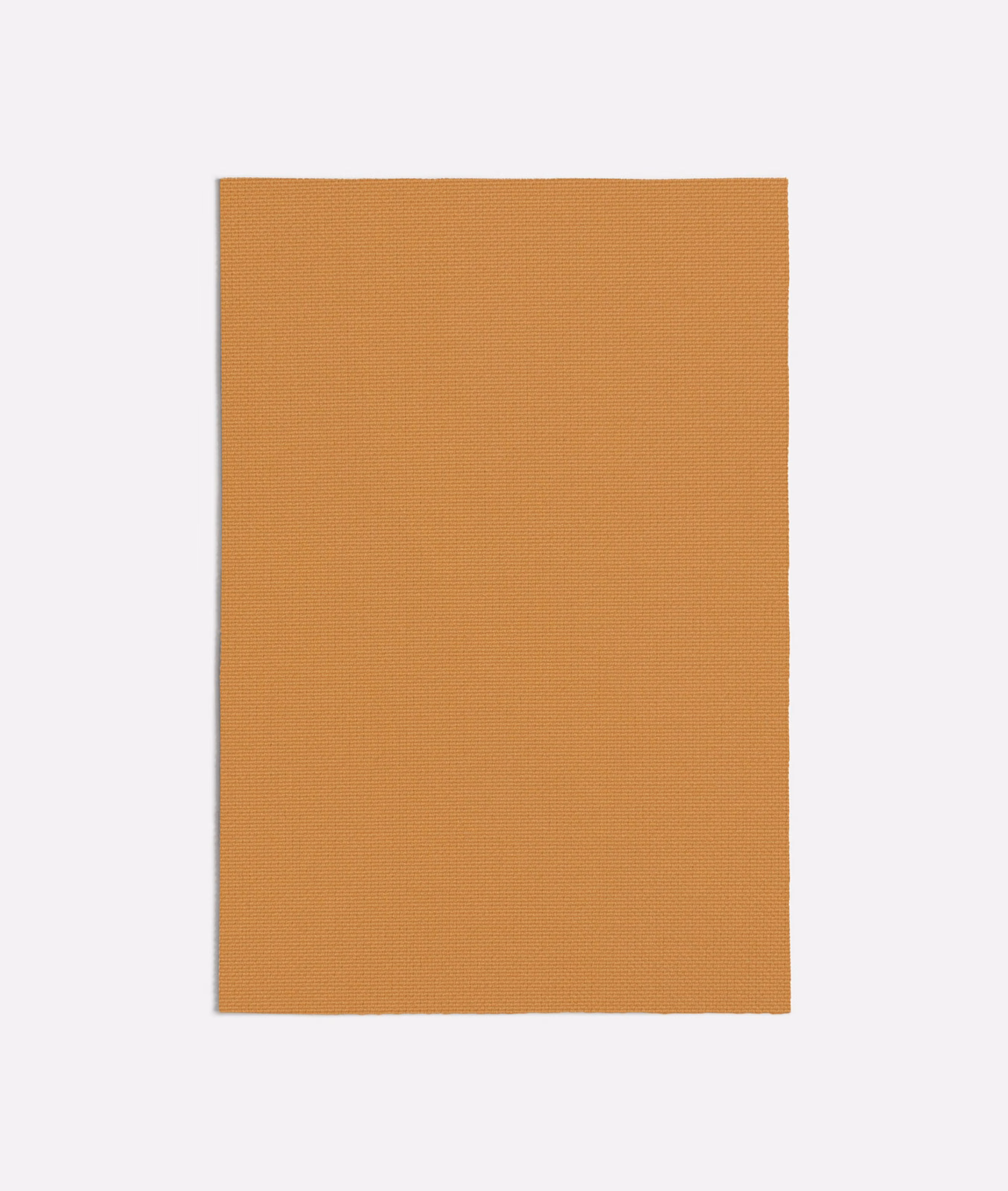 Warm ochre Ginostra Ocra swatch showing a fine, tightly woven surface
