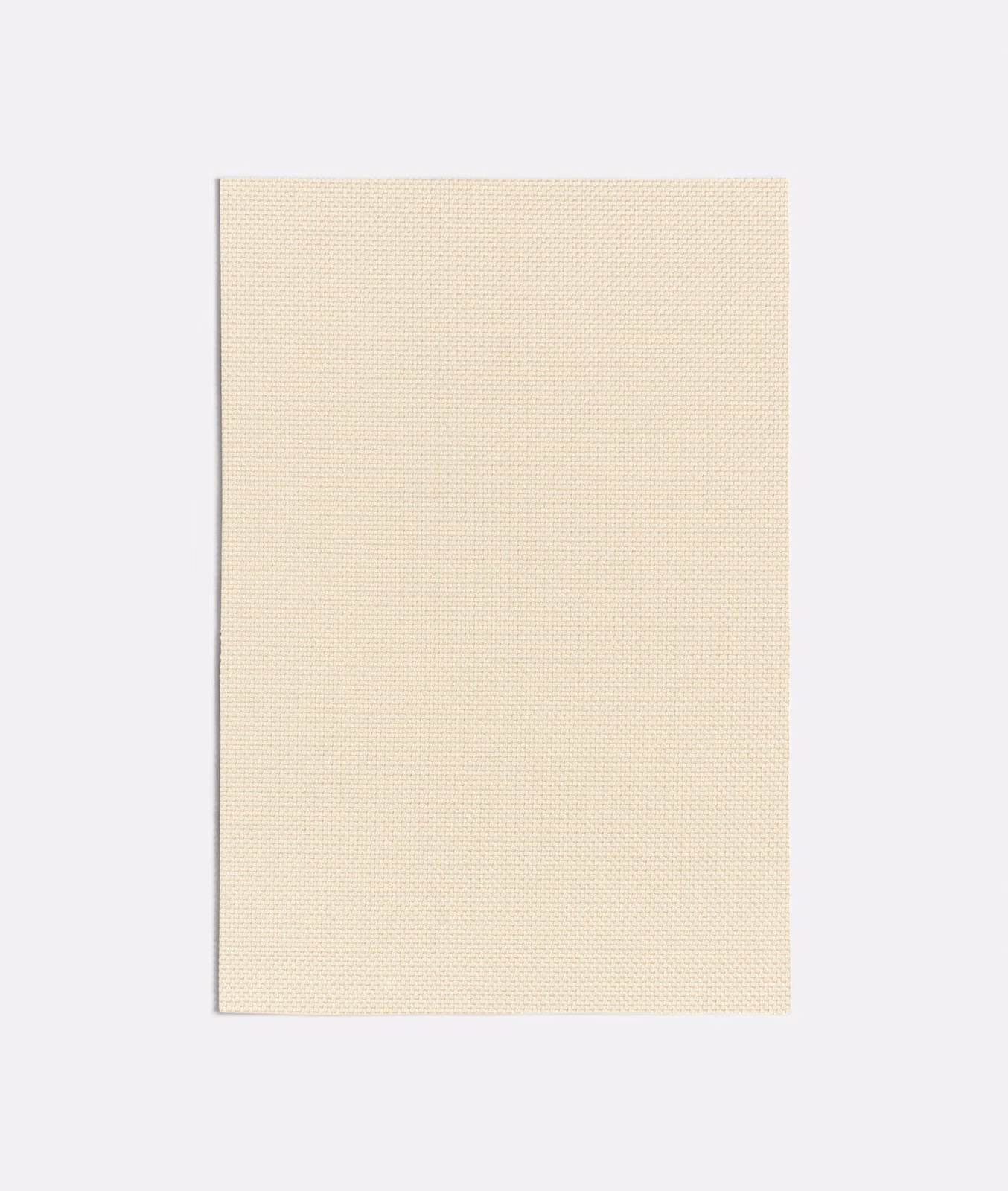 Pale sand textile with a fine, even micro-woven surface