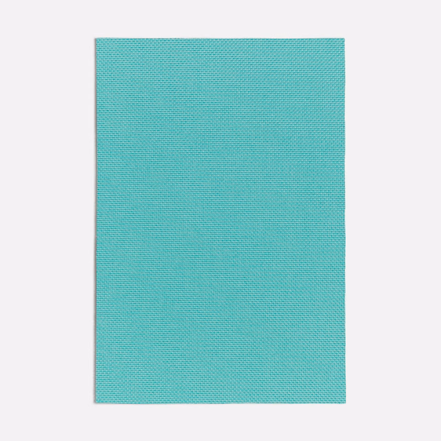 Bright turquoise fabric swatch with an even fine micro-woven texture