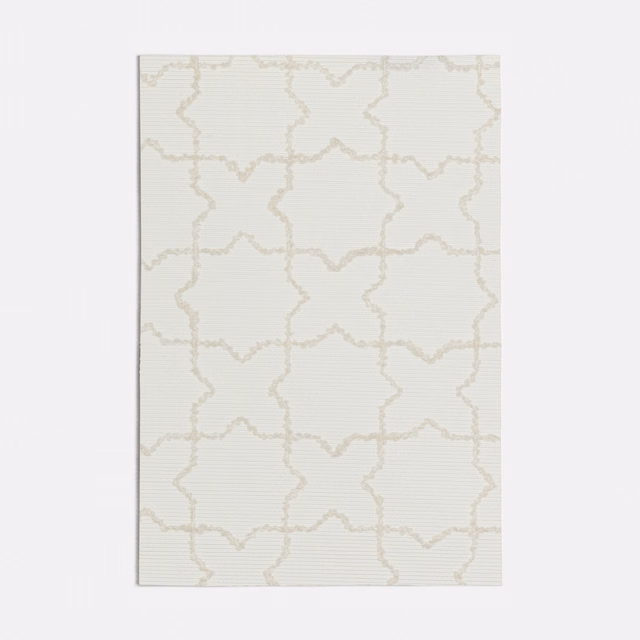 Pale ivory woven fabric with fine taupe star-and-cross lattice