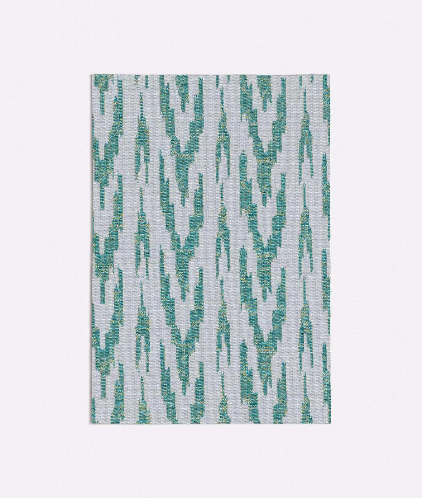 Cool turquoise broken ikat columns on a pale grey woven ground