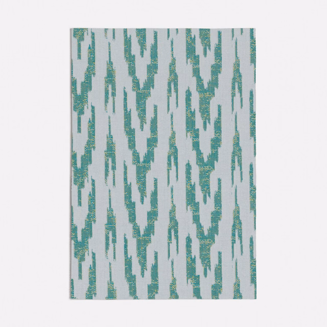 Cool turquoise broken ikat columns on a pale grey woven ground