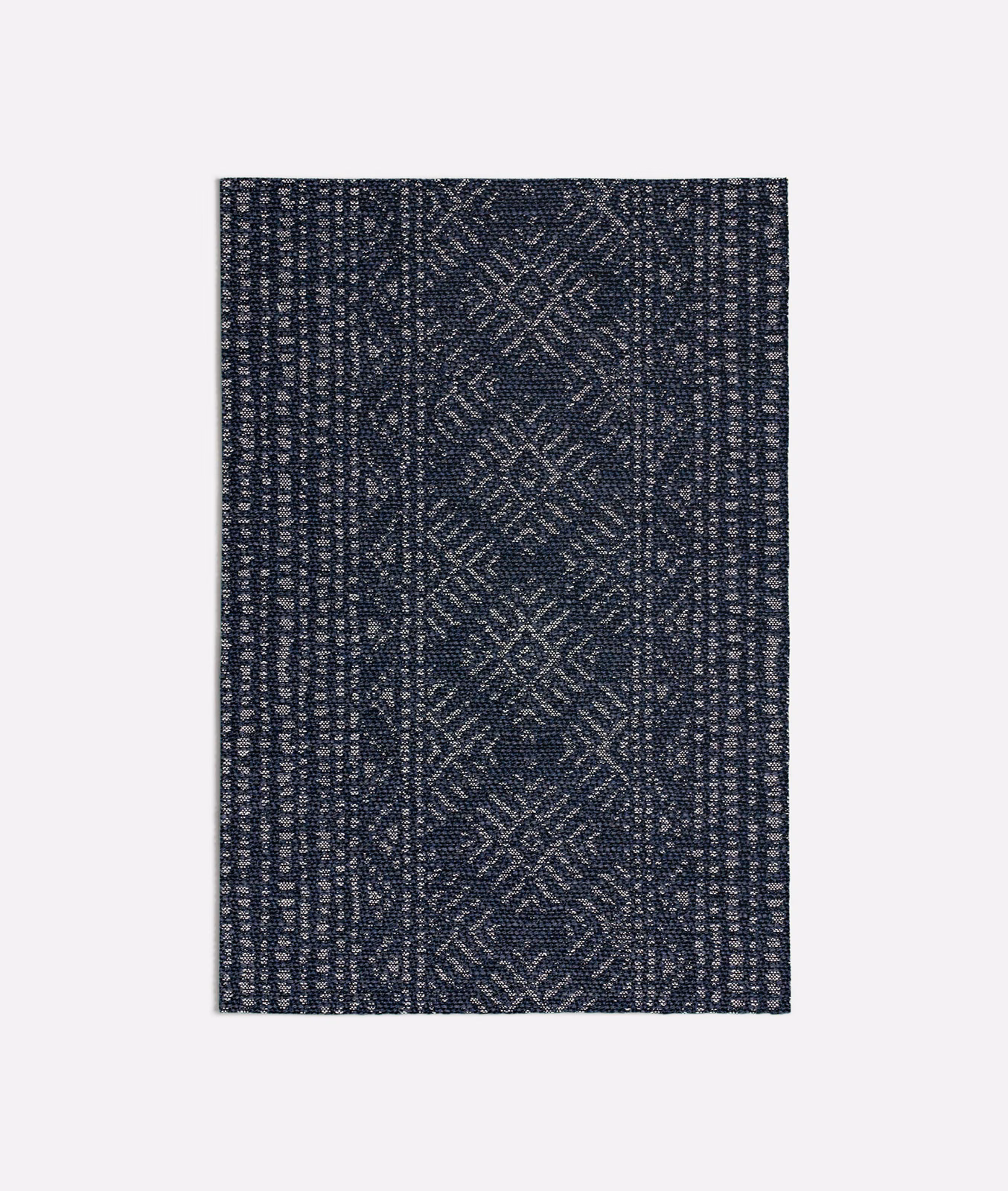 Deep navy woven swatch with pale geometric diamonds and textured vertical borders