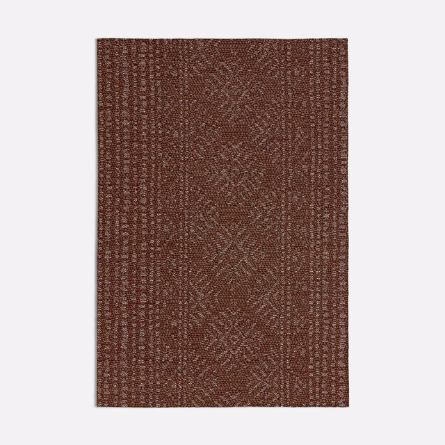 Warm red-brown woven swatch with vertical bands and subtle diamond motifs