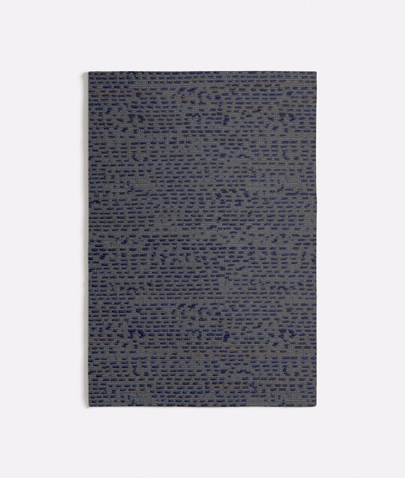 Slate-grey woven fabric with irregular navy horizontal dashes and tactile texture