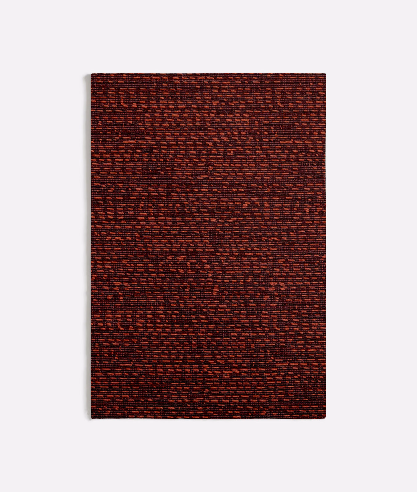 Dense deep rust-orange weave with burgundy and black horizontal flecks