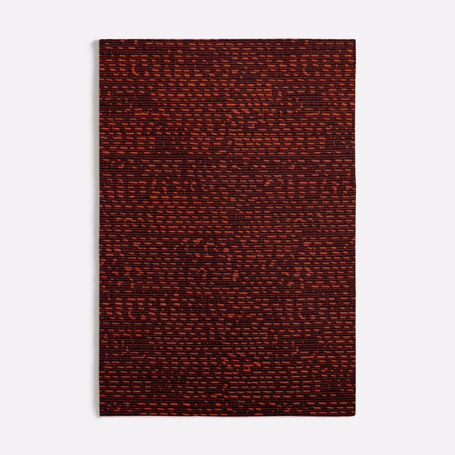 Dense deep rust-orange weave with burgundy and black horizontal flecks