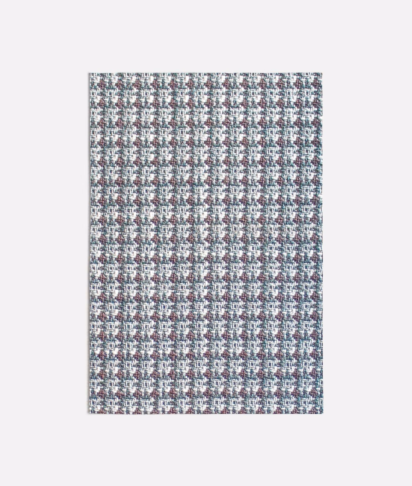 Close view of muted seafoam tweed weave with white, charcoal and burgundy flecks.
