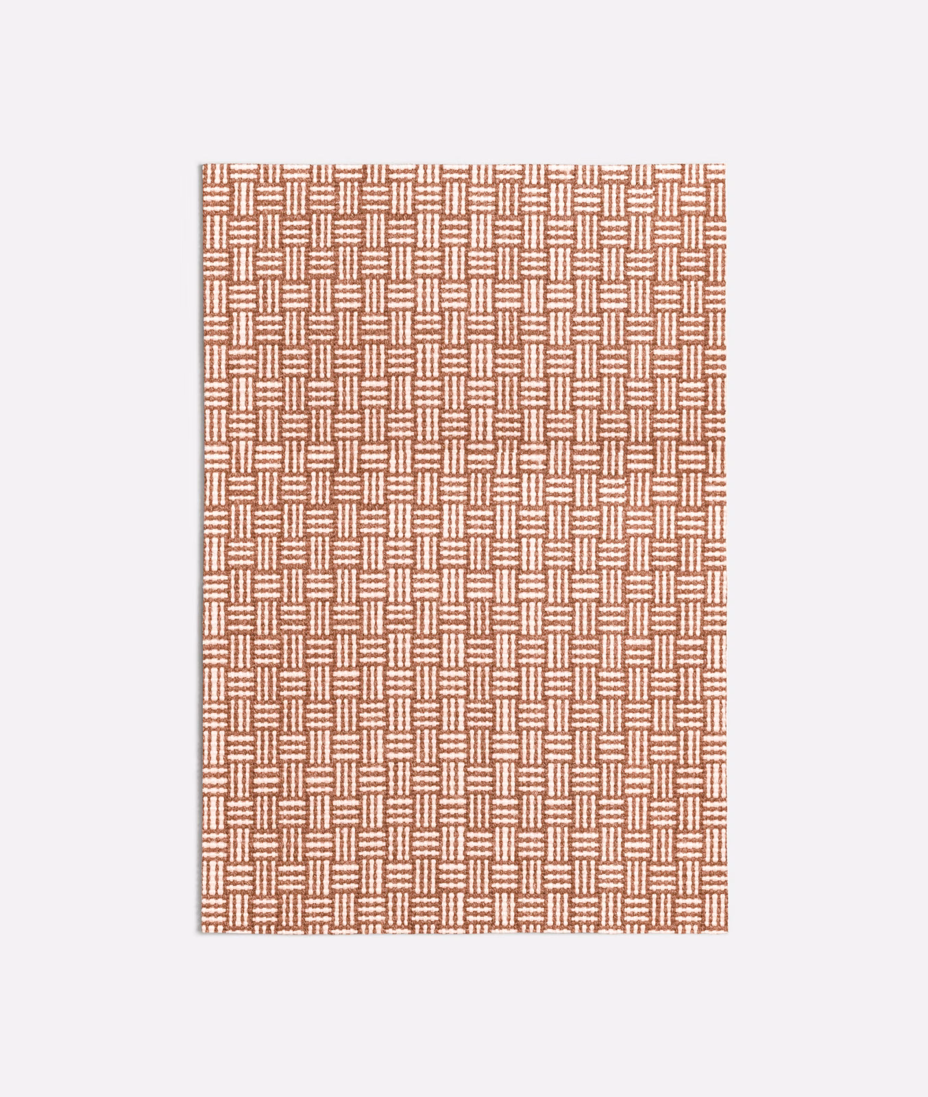 Terracotta woven swatch with a small repeating cream basket-weave geometric motif