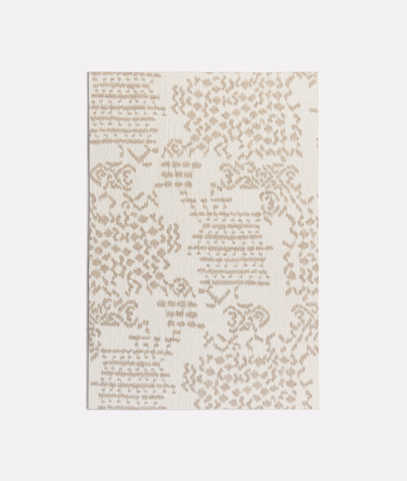 Warm beige swatch with taupe script bands and distressed floral ornament