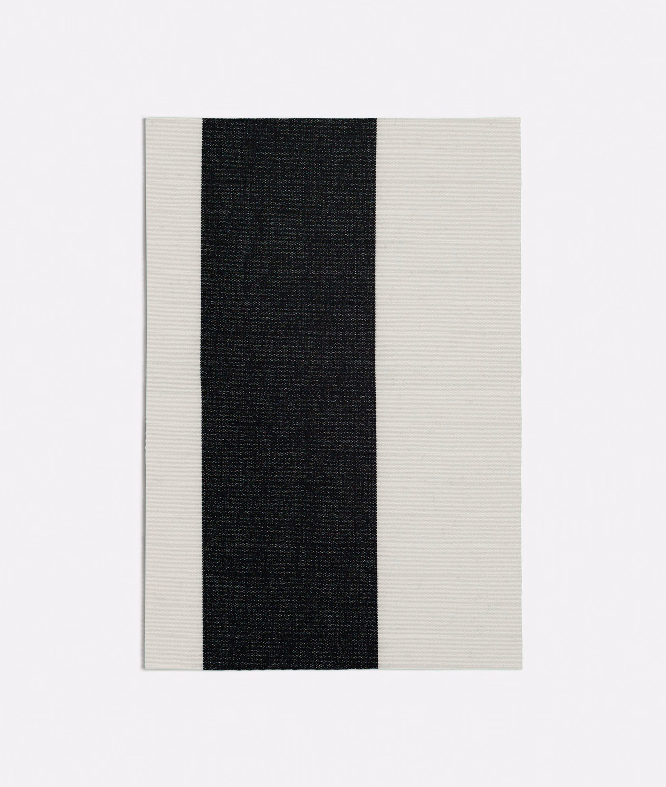 Black central stripe flanked by ivory bands in a fine woven textile