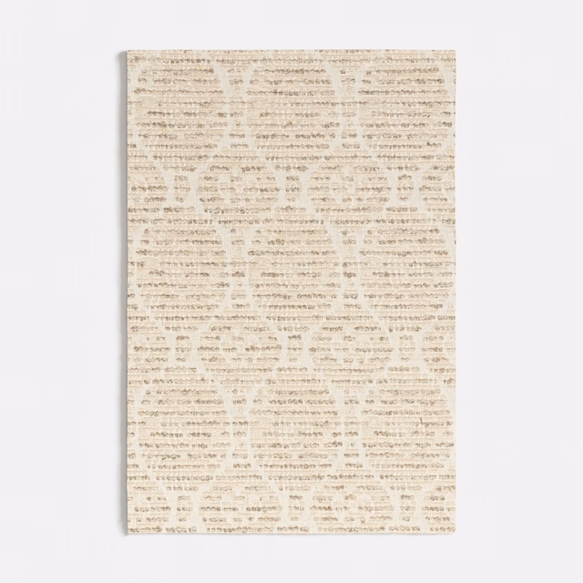 Warm ivory woven fabric with broken taupe horizontal marks and subtle grainy texture