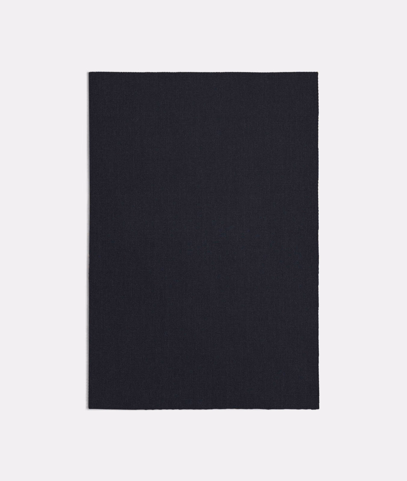 Near-black lapis blue textile with a fine, barely visible woven surface