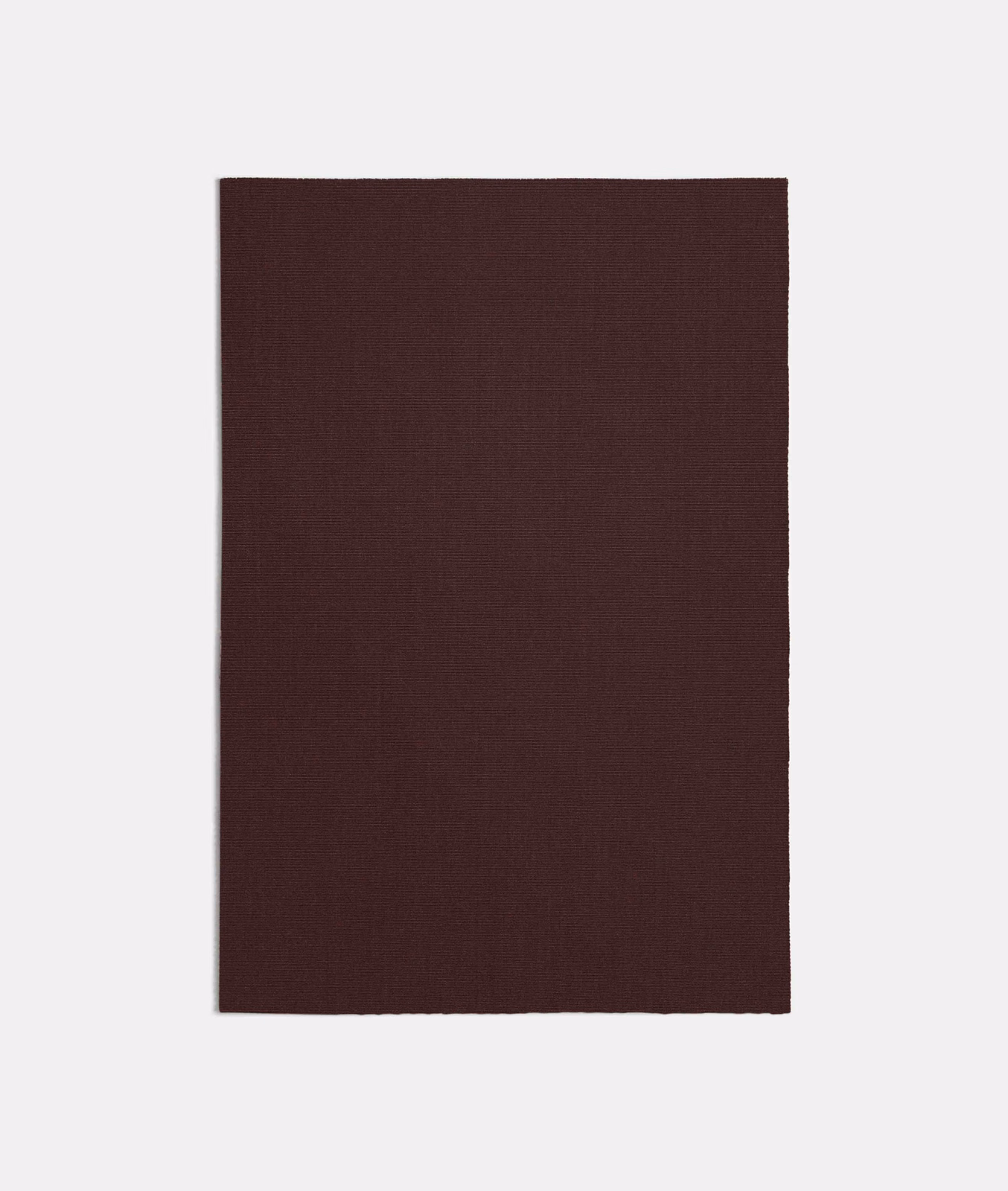 Close view of deep bordeaux plain weave with subtly textured surface
