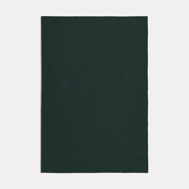 Deep forest-green woven swatch with subtle vertical texture and matte surface