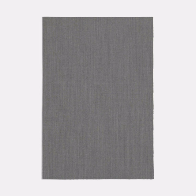 Cool charcoal-grey textile swatch with fine, closely spaced vertical striations