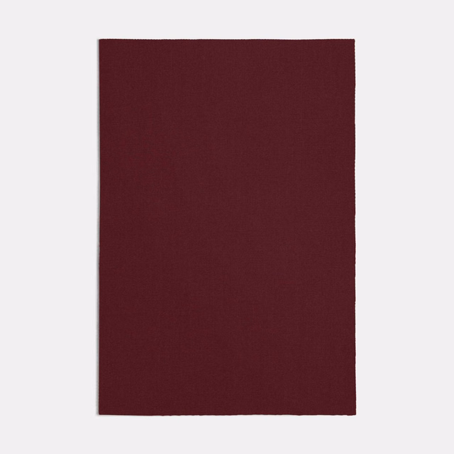 Deep burgundy Lapis Red swatch showing a subtle, even woven texture